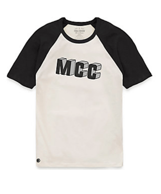 A white shirt with MCC in capital letters across the chest.  It also has black short sleeves and a black collar