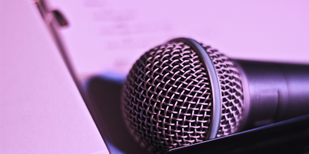picture of a microphone and songbook